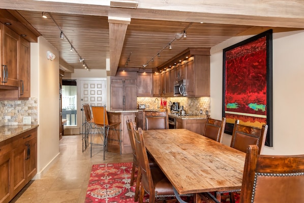 Dining room, wet bar (left of dining table) Kitchen - Beautiful woodwork & decor