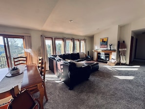 Living room with new carpet and new window treatments