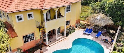 Seaside Villa pool, ocean view and backyard.