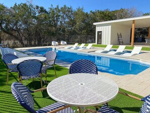 resort pool with plenty of seating