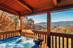 Enjoy the Autumn mountain views while soaking in the outdoor hot tub for four.