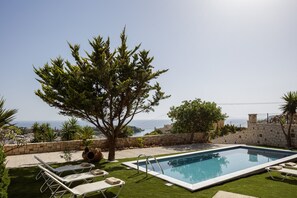 Sophisticated pool surroundings offering a sense of tranquility. 