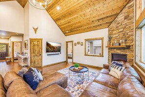 Well lighted great room with comfortable large couch