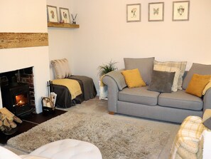 Living room with cozy log burner