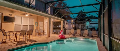 Beautiful pool deck with pool, spa, dining area and loungers