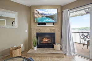 Living room with stunning lake view cable and smart tv & cable