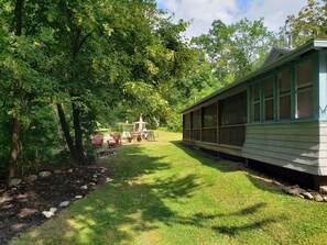 The side screen porch stays shaded for part of the day to help keep cool.
