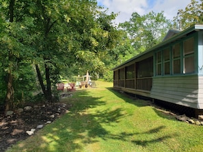 The side screen porch stays shaded for part of the day to help keep cool.