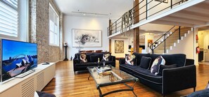 Open plan - Living room, dining plus 2 bedroom upstairs overlook the living area