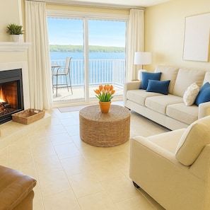 Huge living room with lake view sleeper sofa couch smart tv and lake view