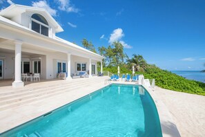 Welcome to Ocean Kai, a sleek 6-bedroom oceanfront villa in North Side. 
