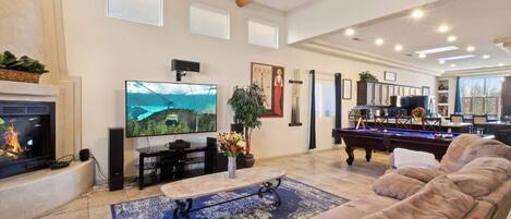 Open plan living, dining and kitchen area incorporating a billiard table