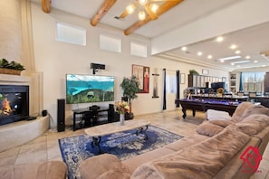 Open plan living, dining and kitchen area incorporating a billiard table