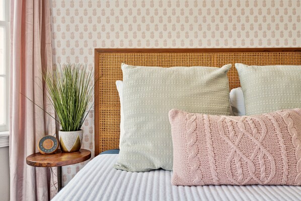 Queen bed. Serena and Lily wallpaper. Sound machine. Blackout blinds.