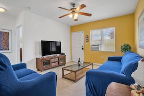 Ceiling fans and air purification systems throughout the apartment. A secure sanitized Miami hideaway.