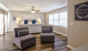 Bedroom 1 - King size bed and chairs that convert to twin beds