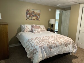 Queen bed with comfortable bedding. Large closet and dresser for extra storage.