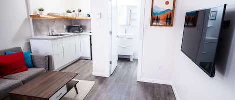 Cute and functional space  Open concept studio unit  With mounted Smart TV