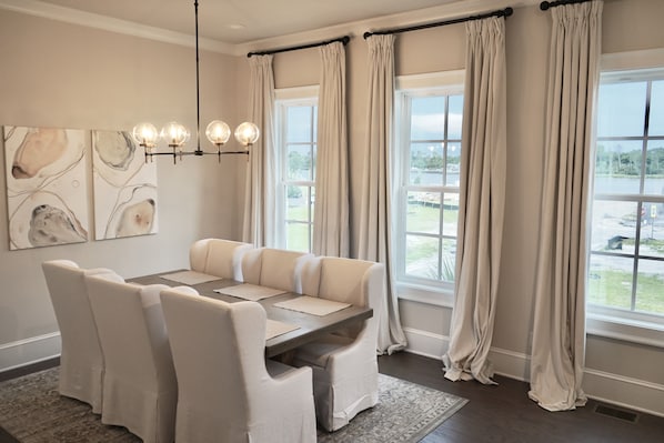 Elegant dining room overlooking the Savannah riverfront. 