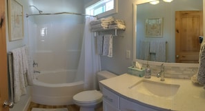 Oversized soaking tub w shower & fresh air window