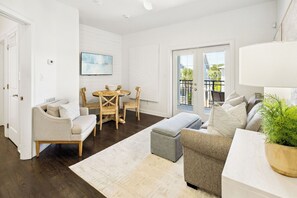 Living Room w/ Sleeper Sofa, Dining Table, TV, and Private Balcony!
