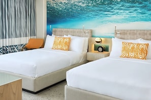Bedroom with a comfortable 2 Double Beds! The exact unit will be assigned upon arrival. Views, colors, and decorations may vary.
