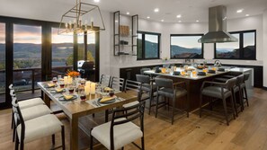 Large dining table with extra seating at kitchen island