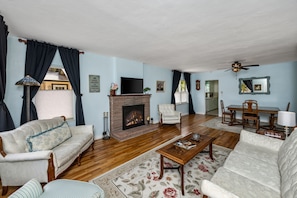 Comfortable Living room with fire place.