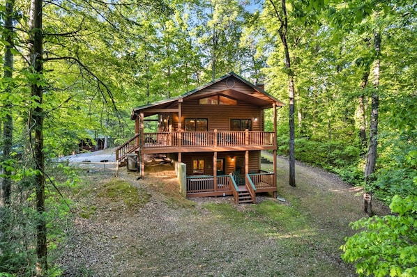 Property is surrounded by trees for the ultimate privacy