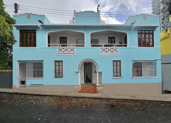 Newly painted building. Parking allowed on both sides of the street.