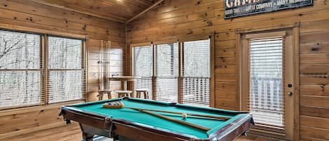 Play pool, air hockey, PacMan/Galaga, + board games in the upper level game room