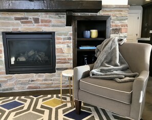 Curl up in this reading nook by the fire.