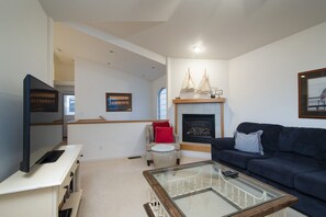 Cozy up to the fireplace after your day full of coastal adventures
