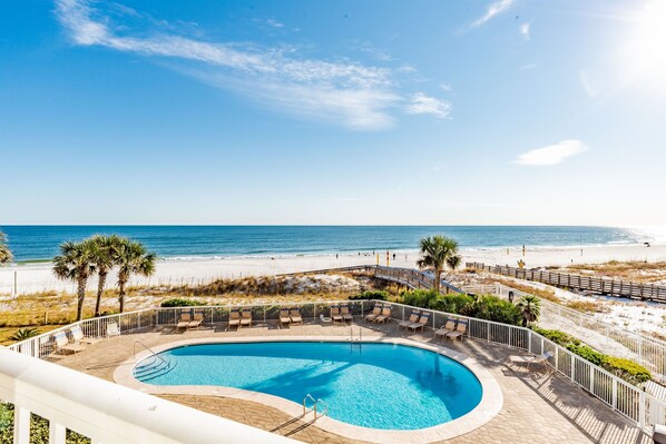 View of the Ocean and the 1st Private Community Pool from the balcony.