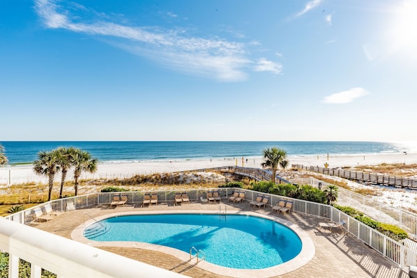 View of the Ocean and the 1st Private Community Pool from the balcony.