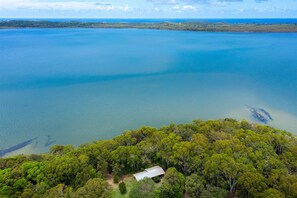 Aerial from lakehouse to coast.