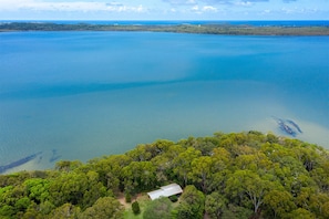 Aerial from lakehouse to coast.