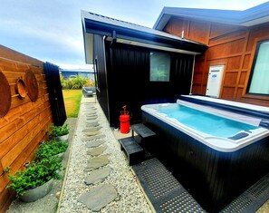 Private and secluded Hot Tub area with mountain top views to soak in