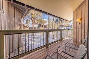 Private deck with outdoor seating.