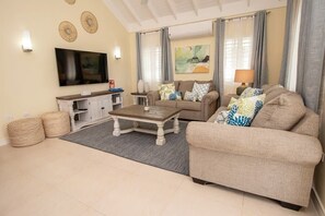 Spacious & Cozy Living Room with SMART Tv.
