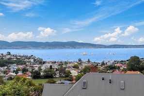 Enjoy breathtaking views from the balcony, overlooking the serene river and vibrant surroundings. It's the ideal spot to start your day or wind down in the evening.