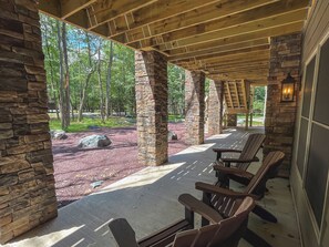 Patio seating covered by raised deck