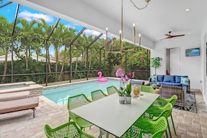 Expansive Lanai with plenty of seating, pool bath, and outdoor shower
