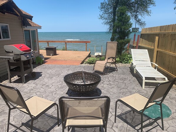 Brand new large patio with firepit, grill, and phenomenal lake views