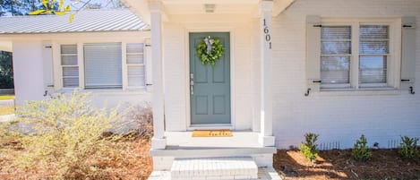 Welcoming front porch with keypad front door for easy check in/check out.