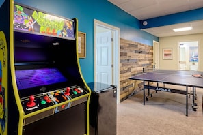 Arcade, ping pong and tons of games for the whole family to come together and have fun! Lower level family room has arcade, ping pong, 75" TV, game closet with books, board games, movies, etc