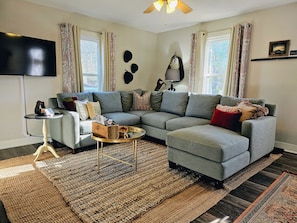 Main floor living room with Roku TV