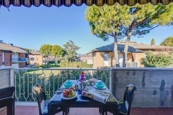 Balcony with table and chair