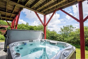 Soak in the Luxurious Hot Tub Just Steps Away