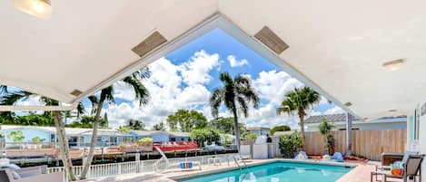 Escape the Florida heat under the extended roof